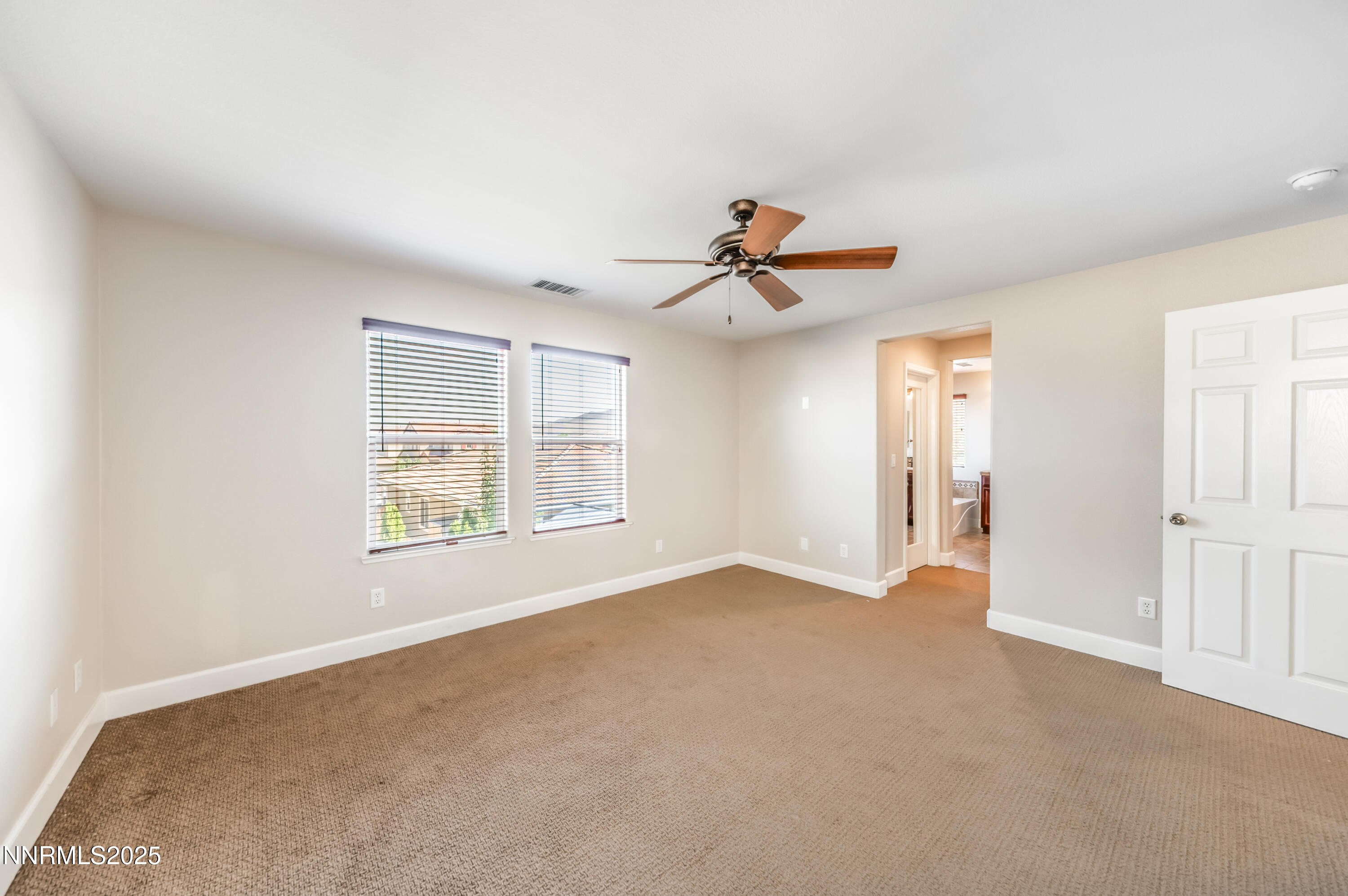 1935 Glacier Meadow Drive Reno, NV 89521 - Photo 13 of 20 a view of empty room with windows