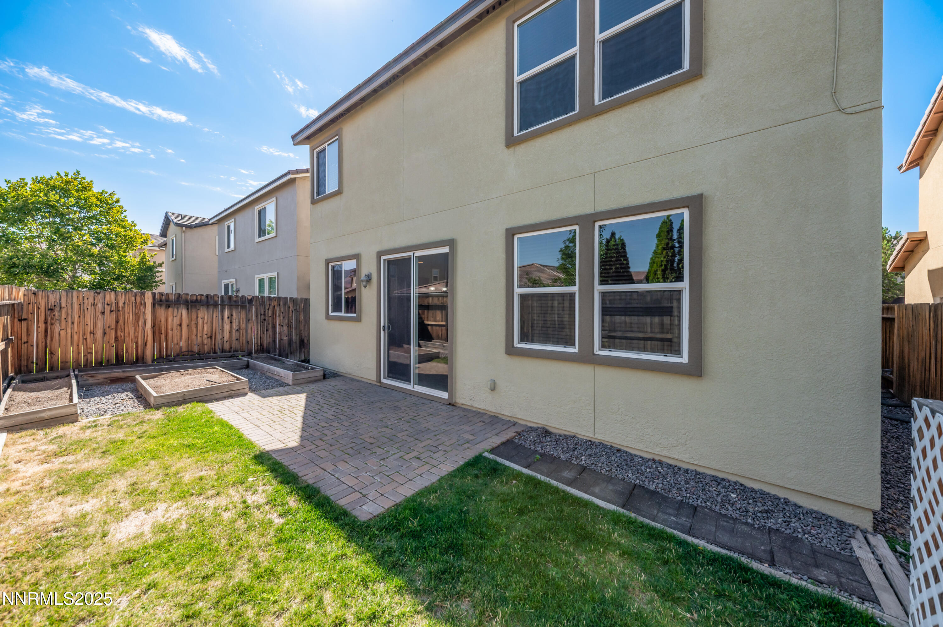 1935 Glacier Meadow Drive Reno, NV 89521 - Photo 20 of 20 a view of a house with backyard and wooden fence
