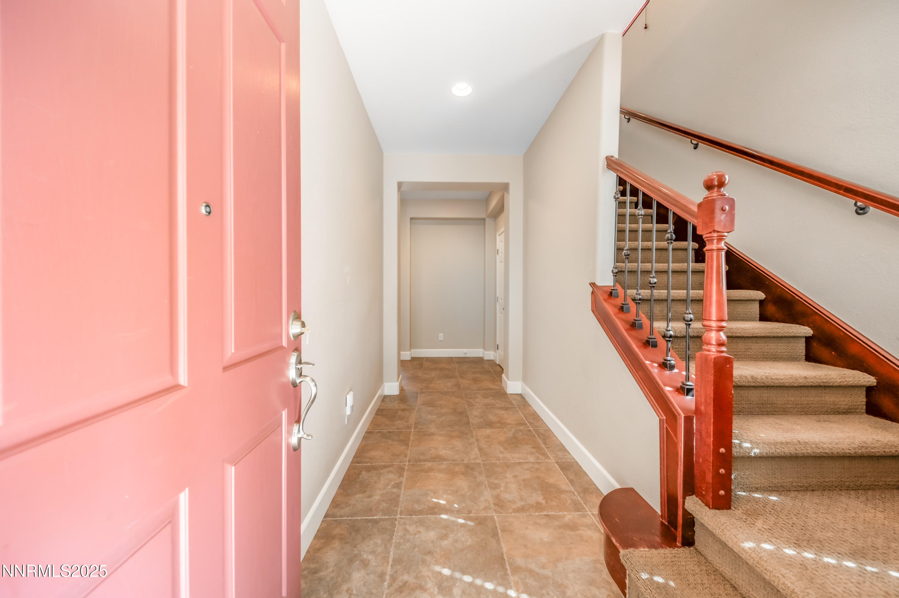 1935 Glacier Meadow Drive Reno, NV 89521 - Photo 3 of 20 a view of a hallway with wooden floor and entryway