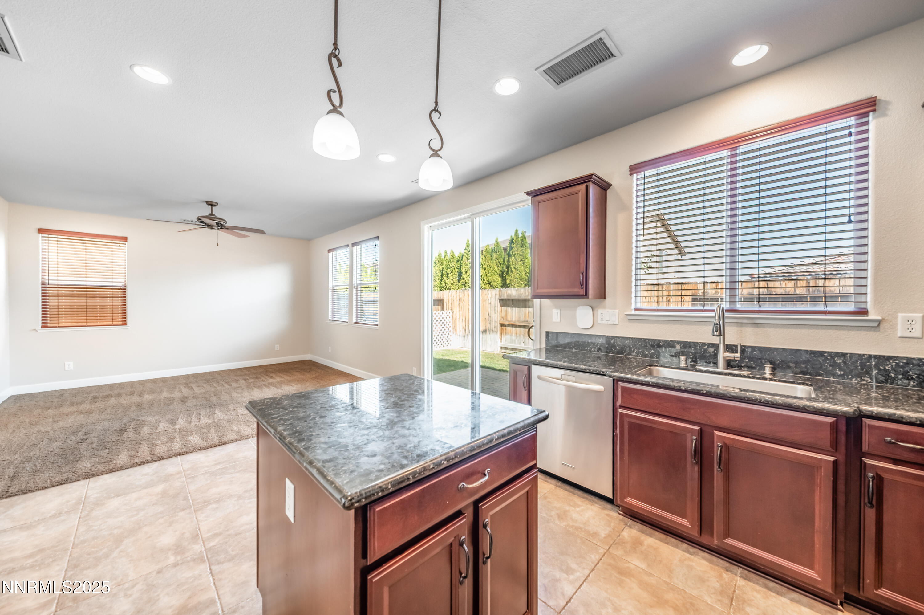 1935 Glacier Meadow Drive Reno, NV 89521 - Photo 7 of 20 a kitchen with lots of counter space and a sink