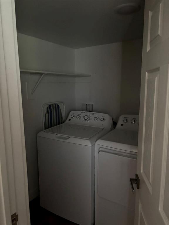 2505 May Street Fort Worth, TX 76110 - Photo 17 of 19 a utility room with dryer and washer