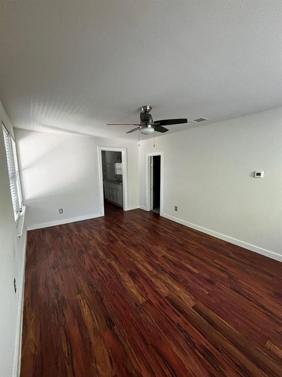 2505 May Street Fort Worth, TX 76110 - Photo 19 of 19 a view of empty room with wooden floor