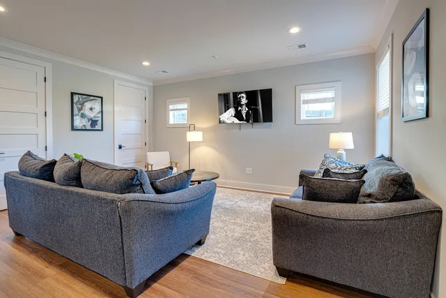 a living room with furniture and a window