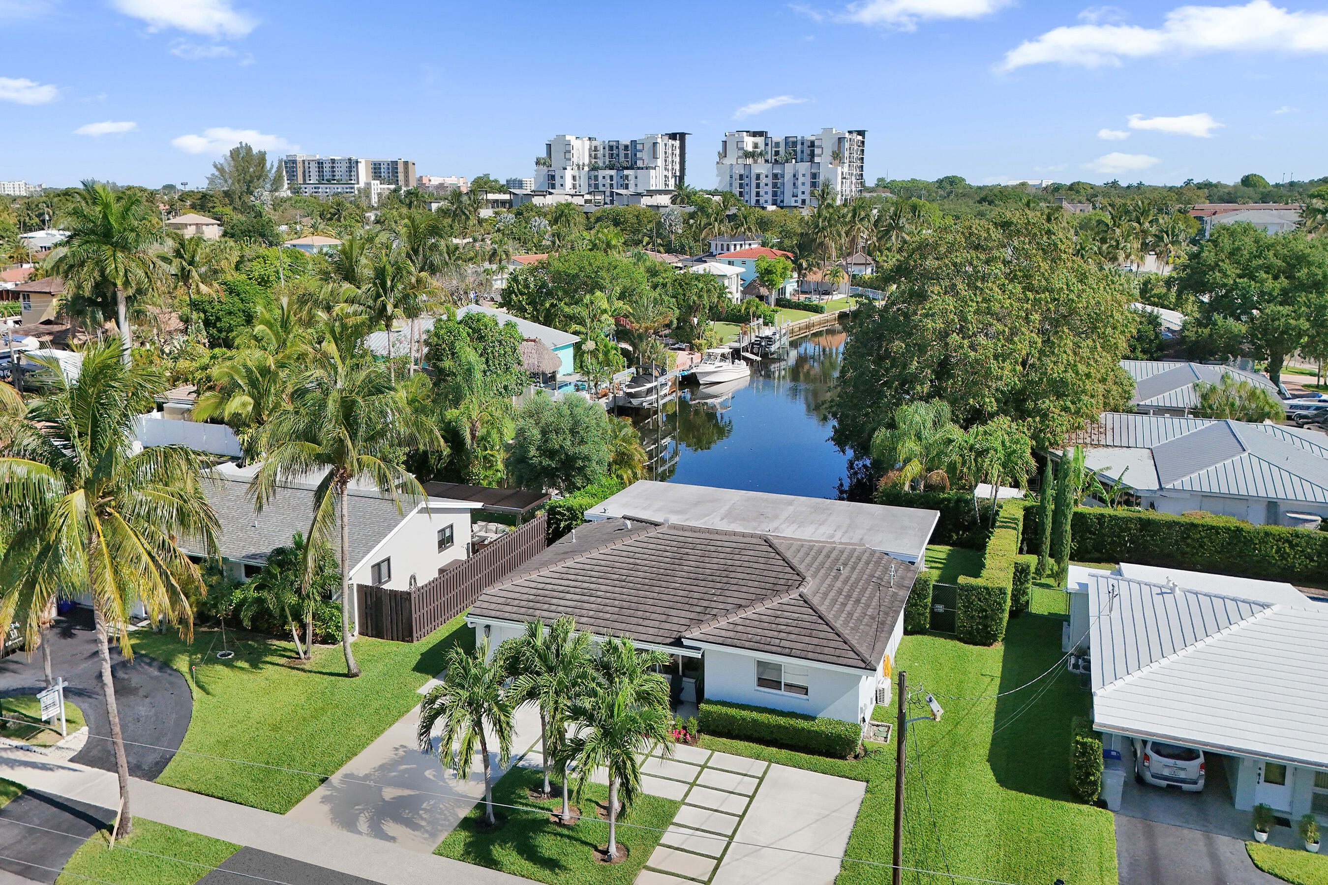 381 Southeast 3rd Street Pompano Beach, FL 33060 - Photo 1 of 41 an aerial view of multiple houses with yard