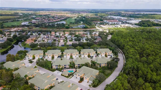 an aerial view of a city with lots of residential buildings