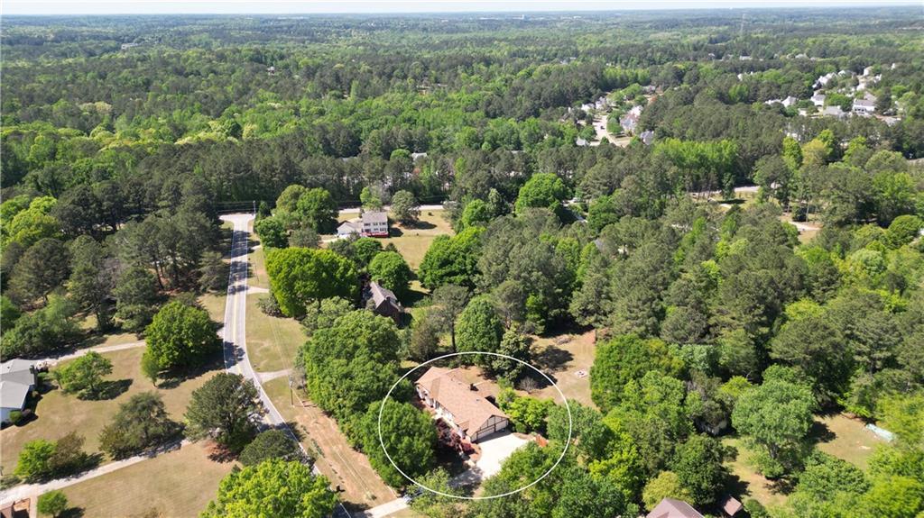 130 Hawn Road Fayetteville, GA 30215 - Photo 56 of 67 an aerial view of a house with a yard