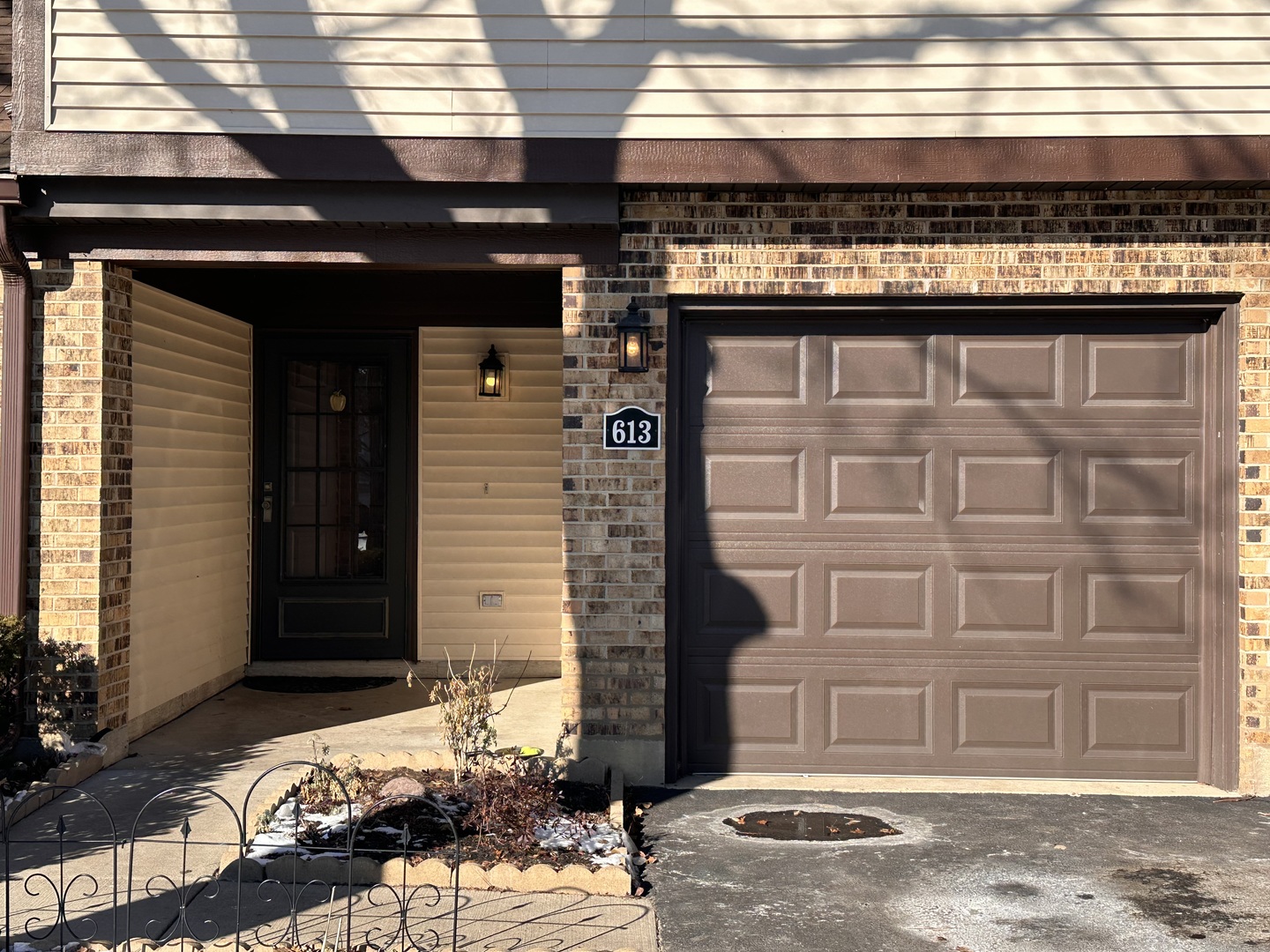 613 Sutton Court Wheeling, IL 60090 - Photo 5 of 36 a view of a house with a door