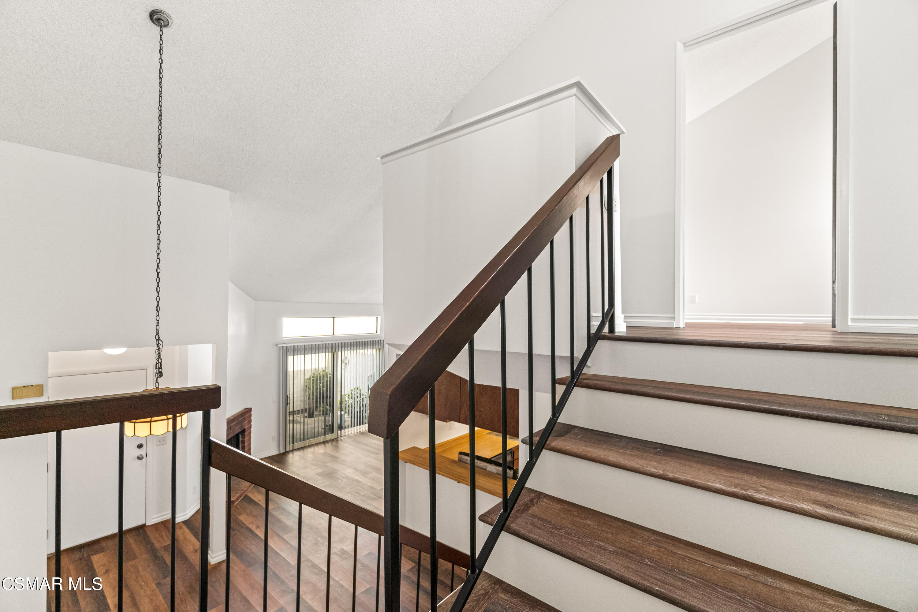 5133 Perkins Road Oxnard, CA 93033 - Photo 17 of 30 a view of staircase with railing and white walls