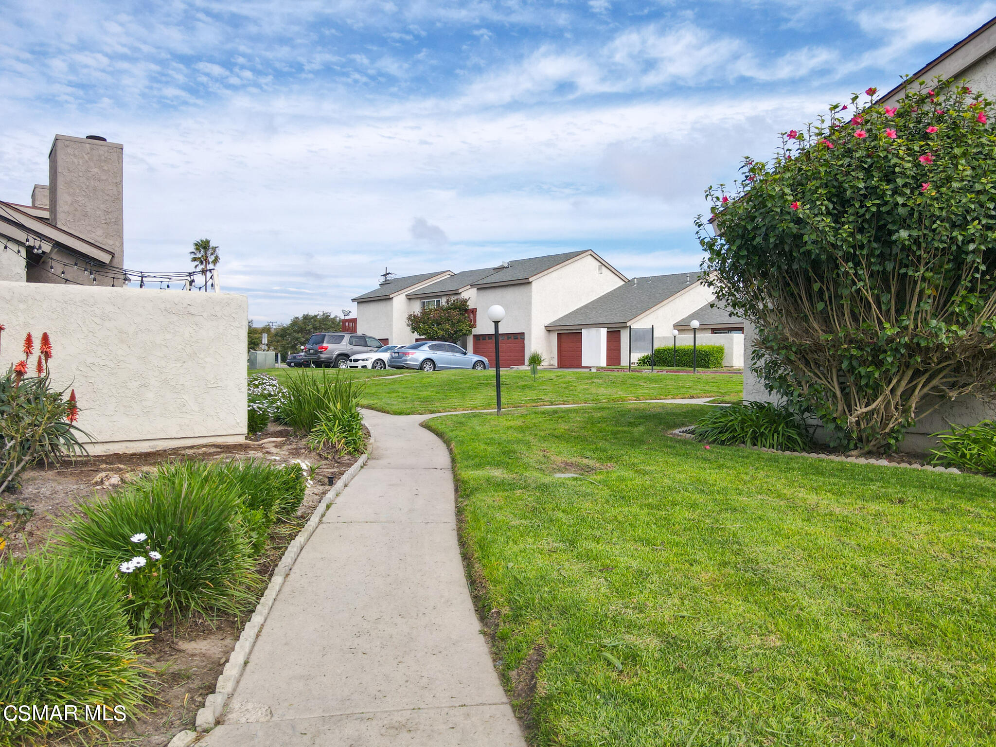 5133 Perkins Road Oxnard, CA 93033 - Photo 6 of 30 a view of a house with a yard