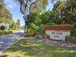 a building with trees in the background