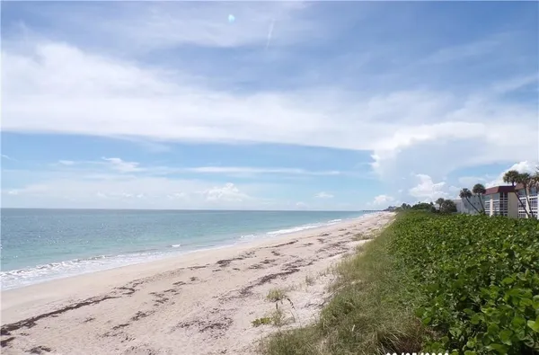 a view of beach and ocean