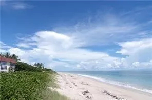 a view of beach and city