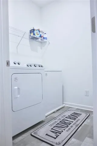 a room with water heater and appliances