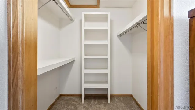 a view of an empty walk in closet
