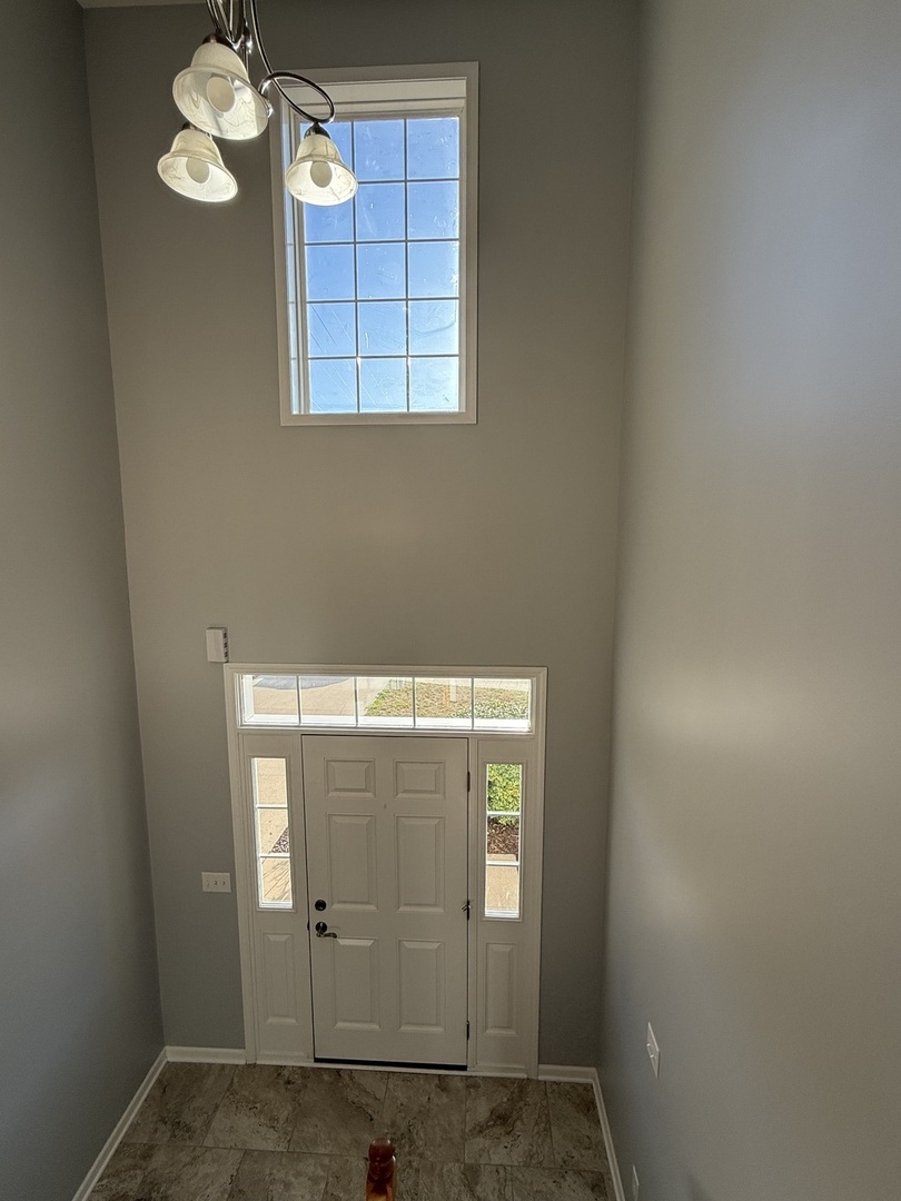 1603 Riverside Circle Dixon, IL 61021 - Photo 17 of 20 an empty room with windows