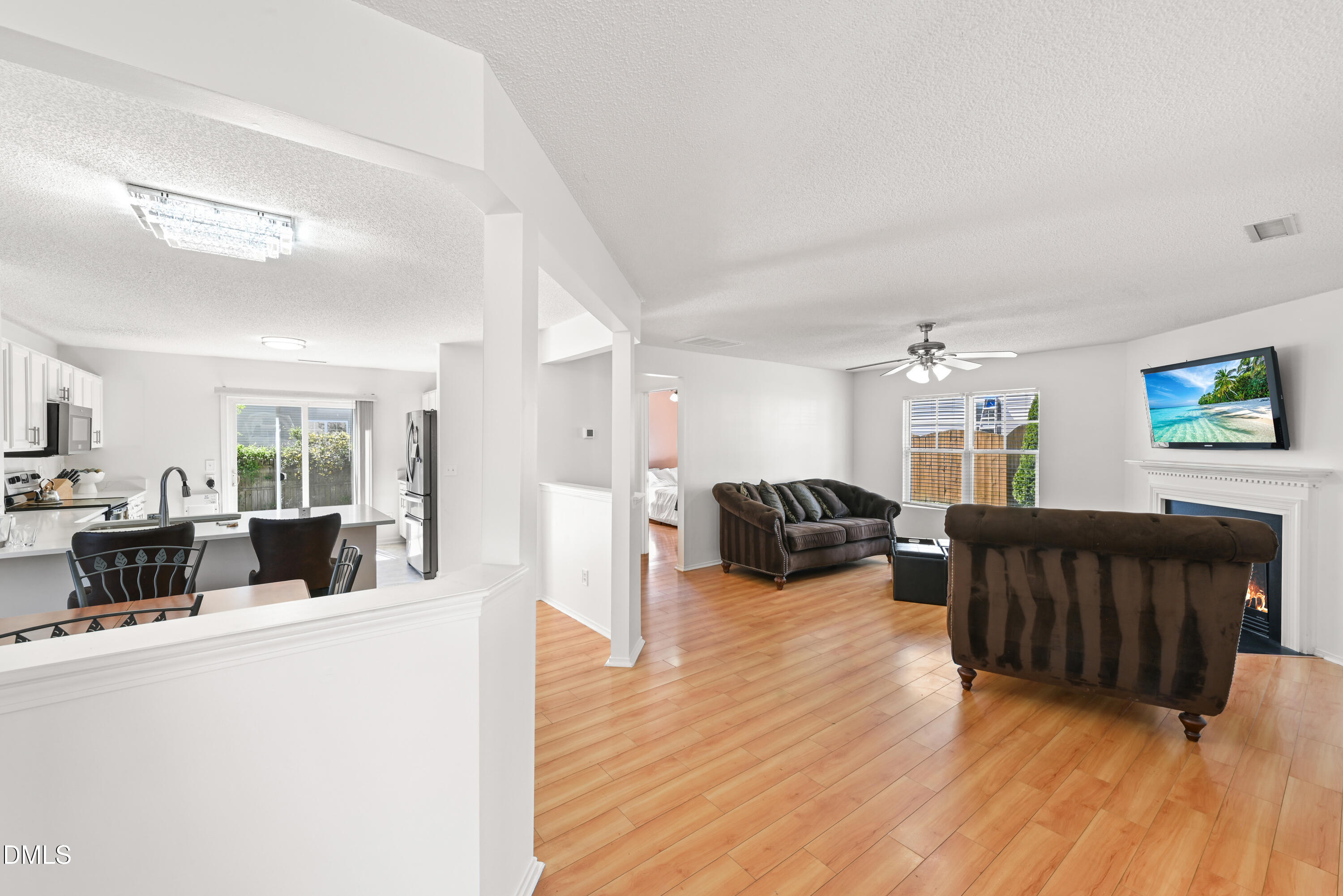 1012 Naylor Road Knightdale, NC 27545 - Photo 9 of 33 a living room with furniture and a flat screen tv