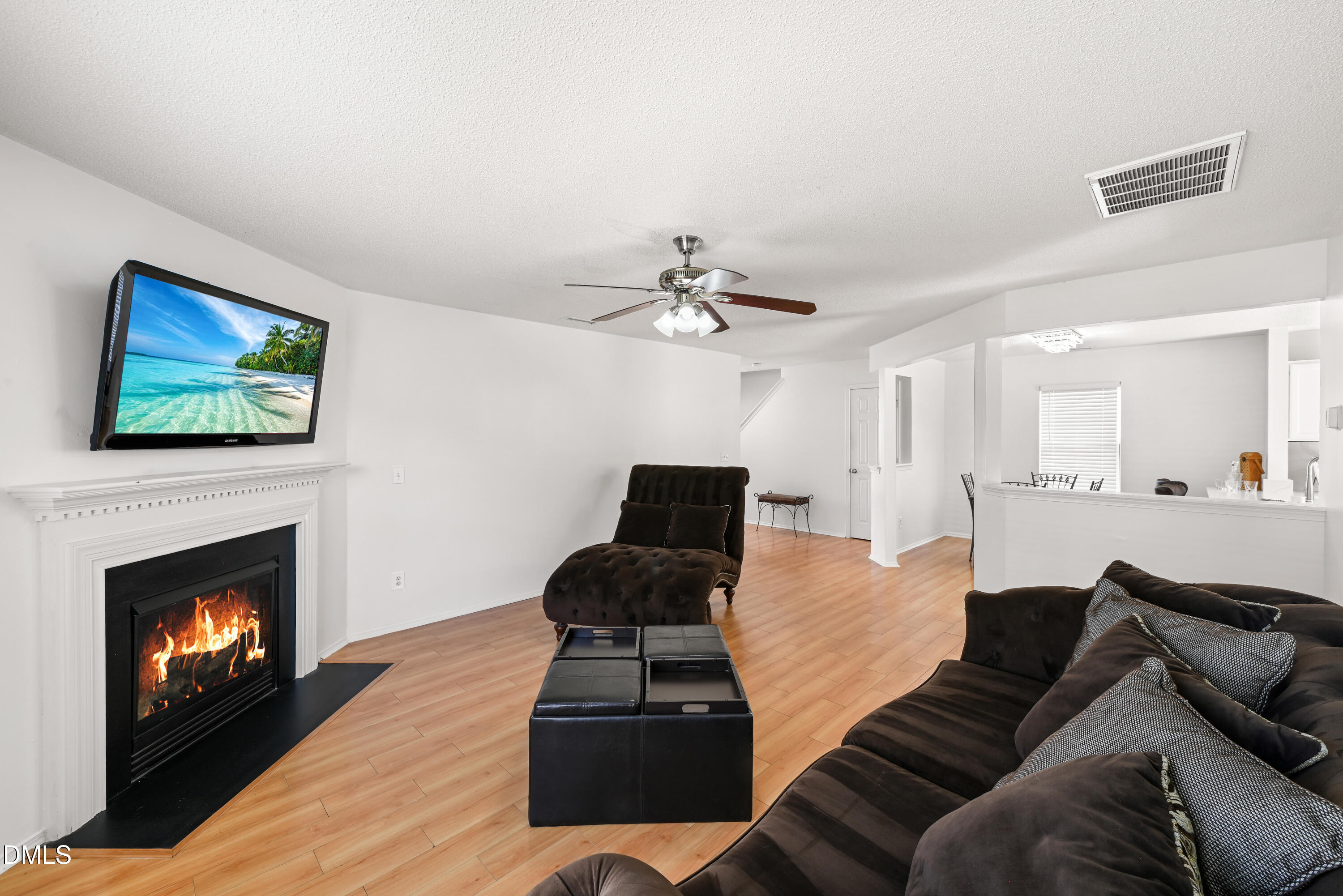 1012 Naylor Road Knightdale, NC 27545 - Photo 12 of 33 a living room with furniture and a fireplace