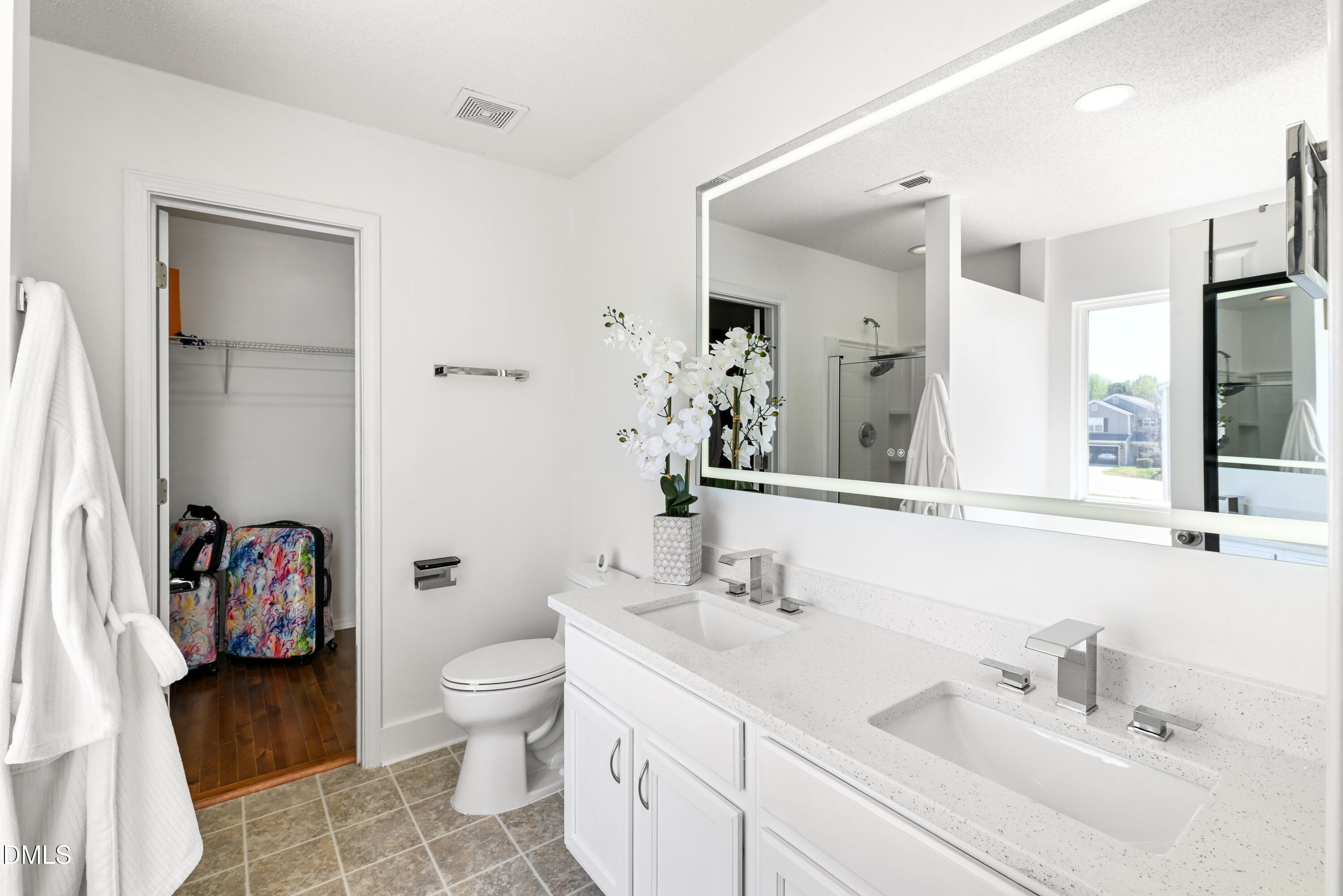 1012 Naylor Road Knightdale, NC 27545 - Photo 15 of 33 a bathroom with a sink toilet and shower