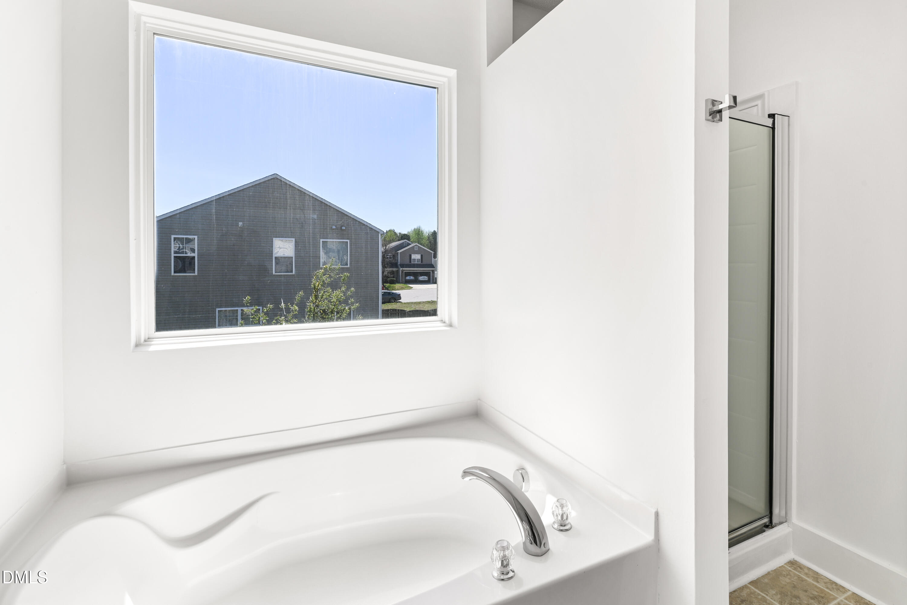 1012 Naylor Road Knightdale, NC 27545 - Photo 16 of 33 a bathroom with a bathtub