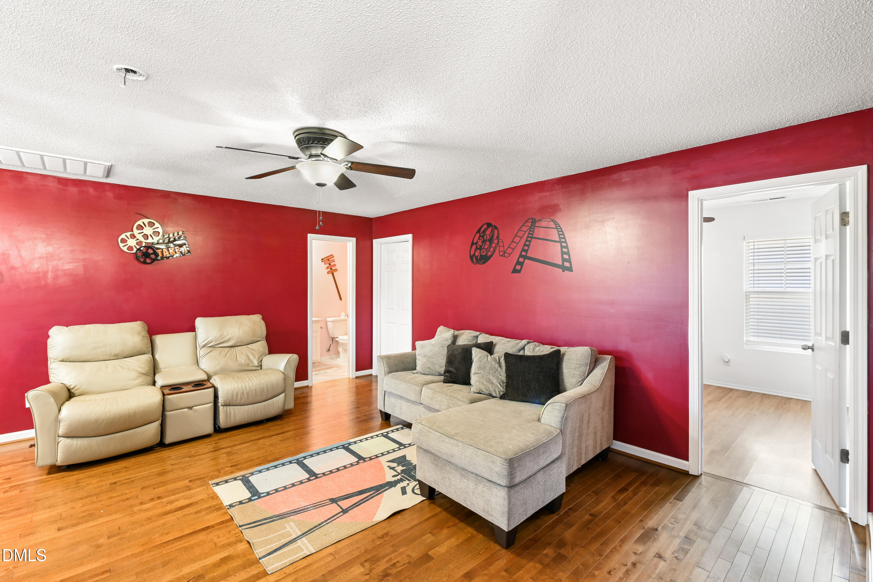 1012 Naylor Road Knightdale, NC 27545 - Photo 21 of 33 a living room with furniture and wooden floor