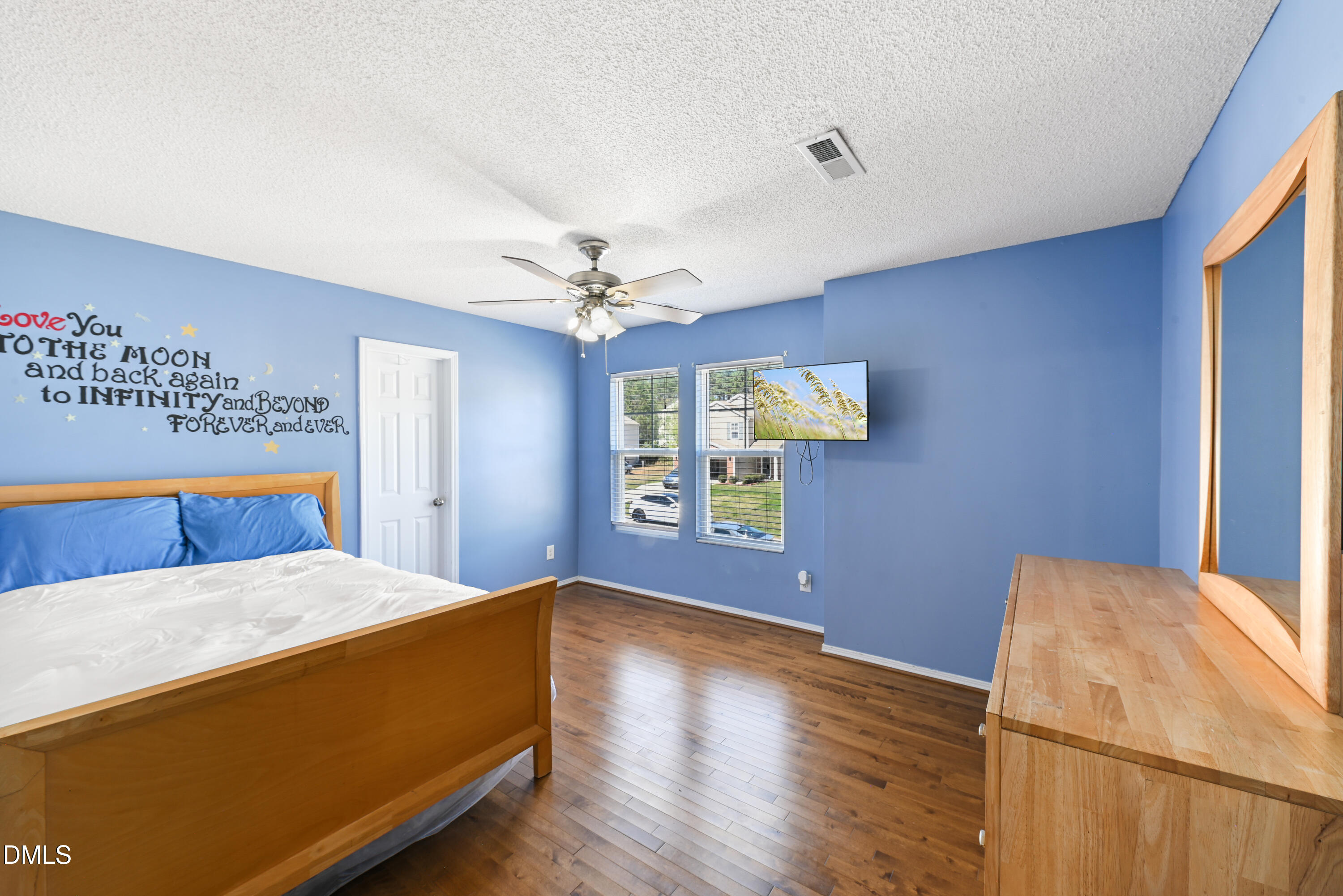 1012 Naylor Road Knightdale, NC 27545 - Photo 23 of 33 a bedroom with a bed and a table