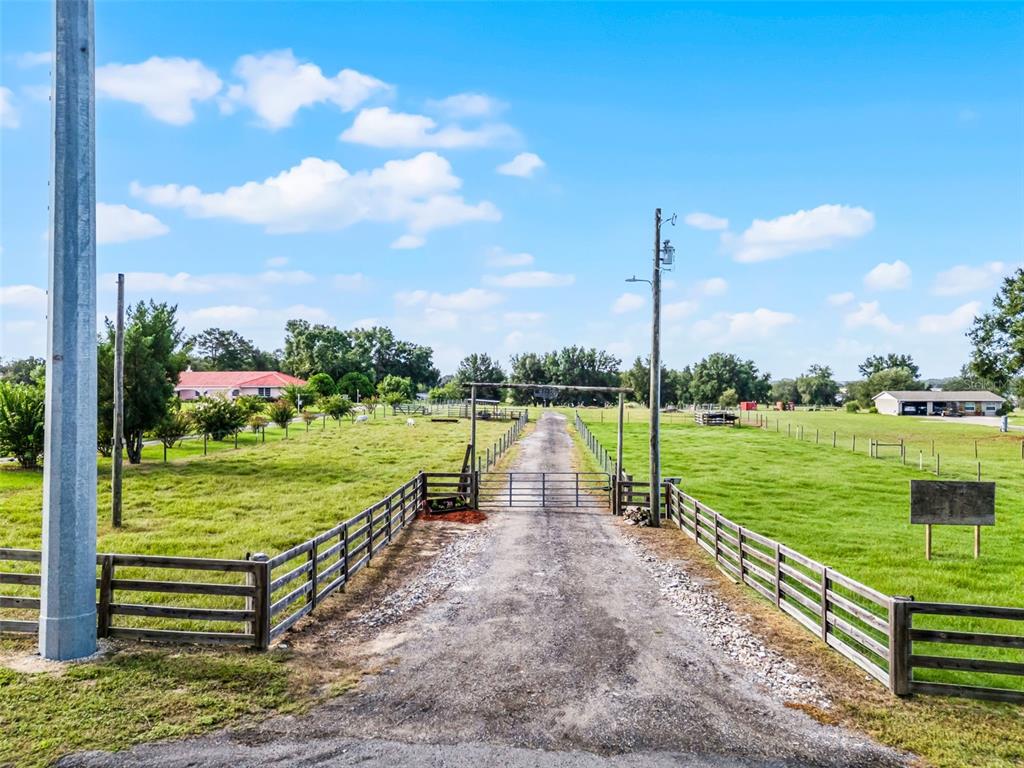 4198 Ondich Road Apopka, FL 32712 - Photo 1 of 1 a view of a lake with a big yard