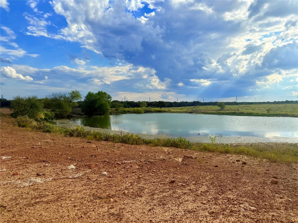 2101 Erwin Road Jacksboro, TX 76458 - Photo 15 of 26 a view of a lake with houses in the back