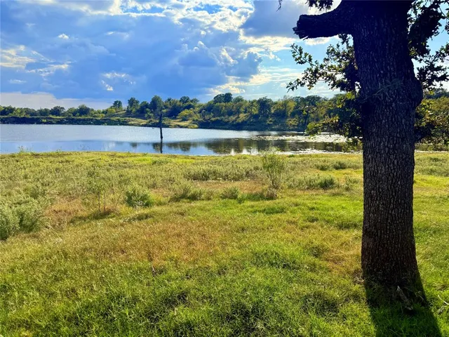 a view of a balcony and lake