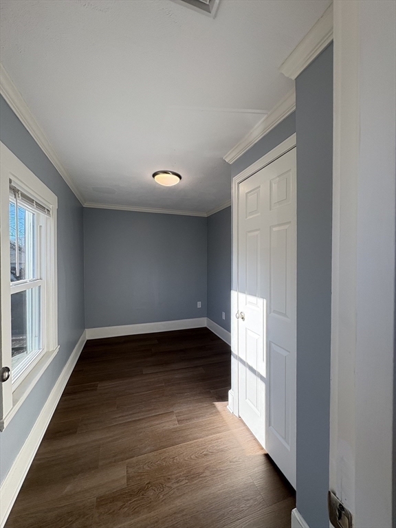 47 Marsh Road Needham, MA 02492 - Photo 16 of 20 an empty room with wooden floor and windows