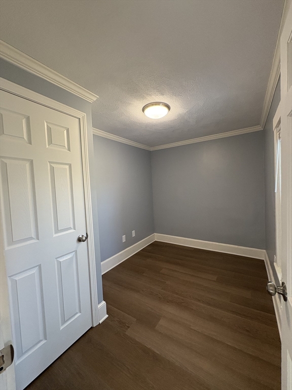 47 Marsh Road Needham, MA 02492 - Photo 17 of 20 an empty room with wooden floor and windows