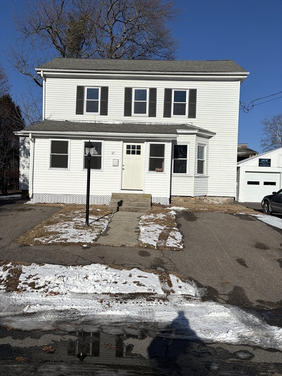 47 Marsh Road Needham, MA 02492 - Photo 2 of 20 a front view of a house with a yard