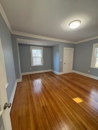 a view of an empty room and window
