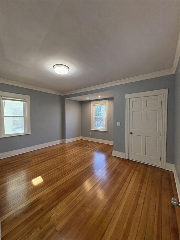47 Marsh Road Needham, MA 02492 - Photo 8 of 20 a view of empty room with wooden floor and fan