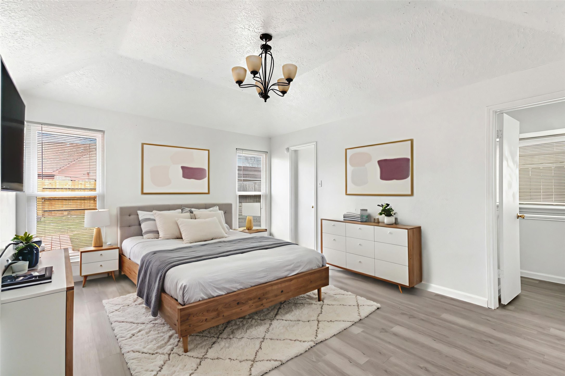 8315 Old Maple Lane Humble, TX 77338 - Photo 11 of 19 Private primary bedroom with en suite bathroom and walk-in closet. (This photo is virtually staged.)