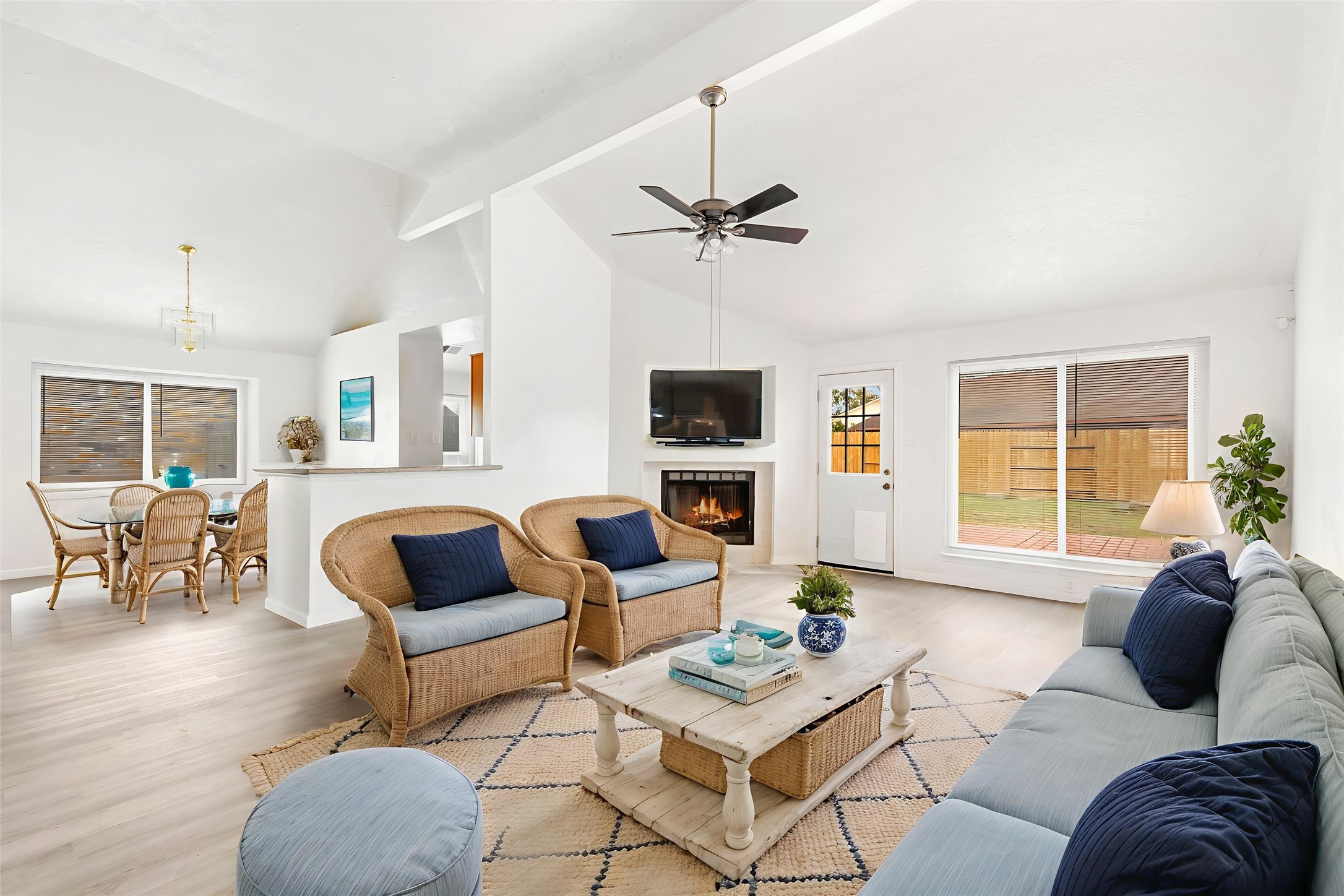 8315 Old Maple Lane Humble, TX 77338 - Photo 2 of 19 Spacious living room with dining room and kitchen in the backgroud. (This photo is virtually staged.)