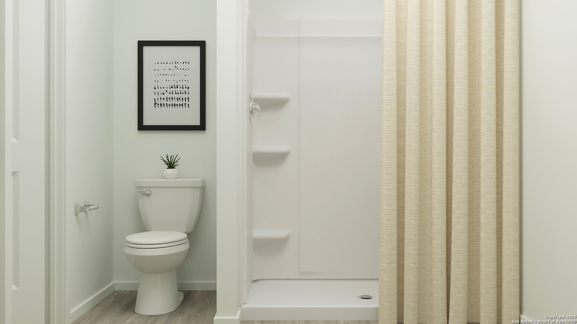 190 Bronco Ridge Pleasanton, TX 78064 - Photo 19 of 26 a bathroom with a toilet and a shower