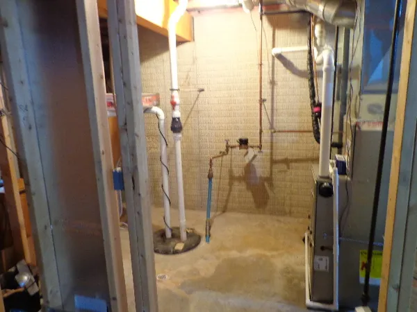 a bathroom with a glass shower door