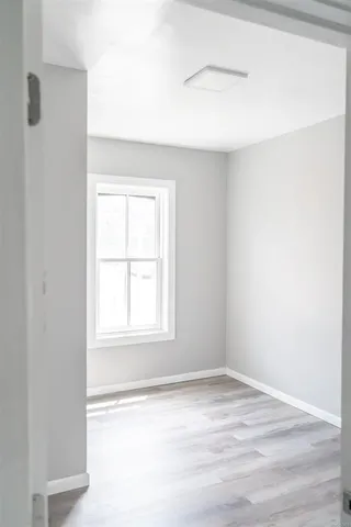 an empty room with a window