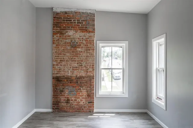 an empty room with windows