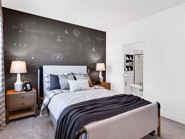a view of a livingroom with furniture and a window