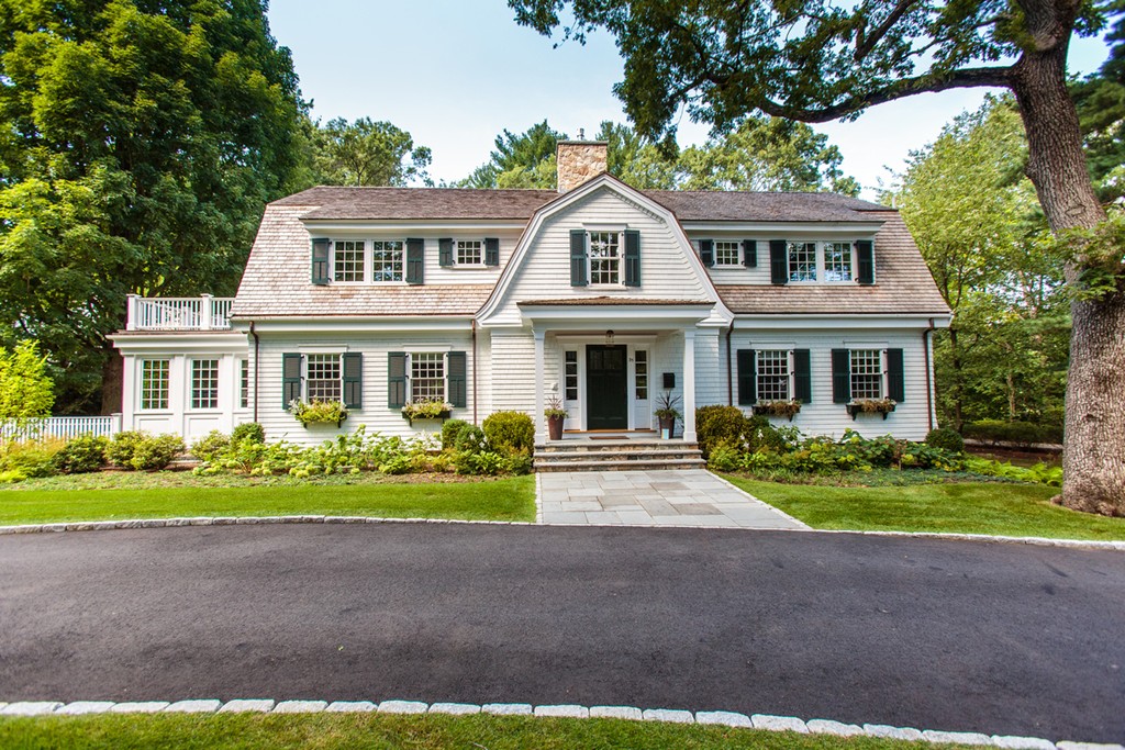 35 Hundreds Road Wellesley, MA 02481 - Photo 1 of 27 a front view of a house with a yard and porch