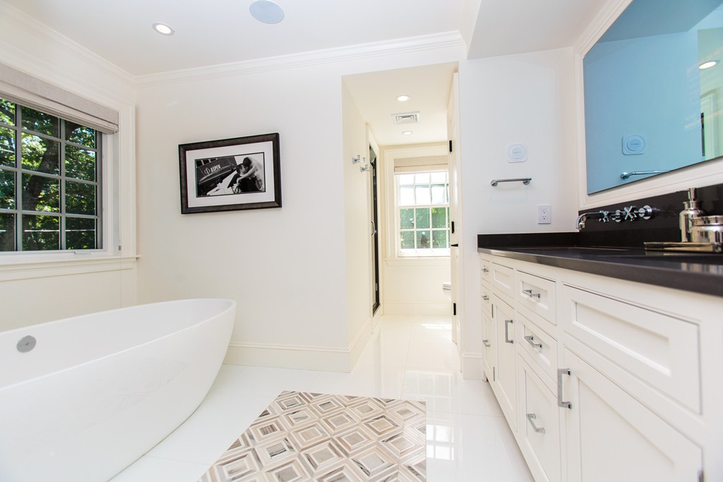 35 Hundreds Road Wellesley, MA 02481 - Photo 17 of 27 a bathroom with a bathtub and a shower