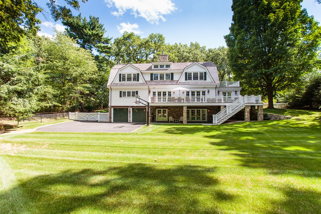 35 Hundreds Road Wellesley, MA 02481 - Photo 25 of 27 a view of a house with a big yard and large trees