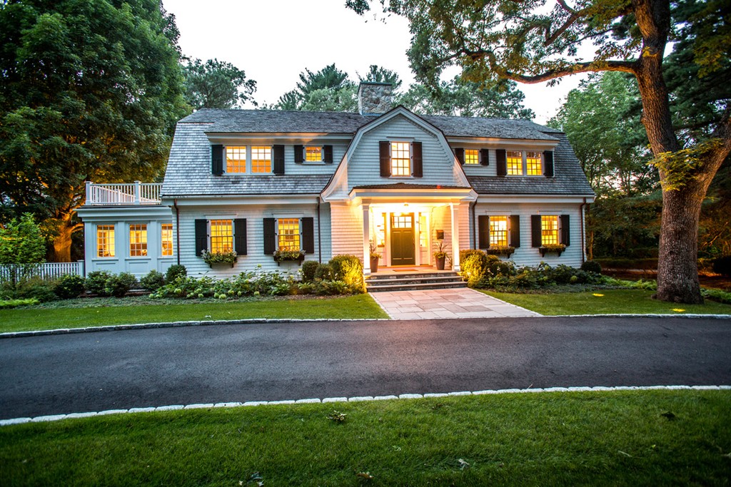 35 Hundreds Road Wellesley, MA 02481 - Photo 26 of 27 a front view of a house with a yard and a garage