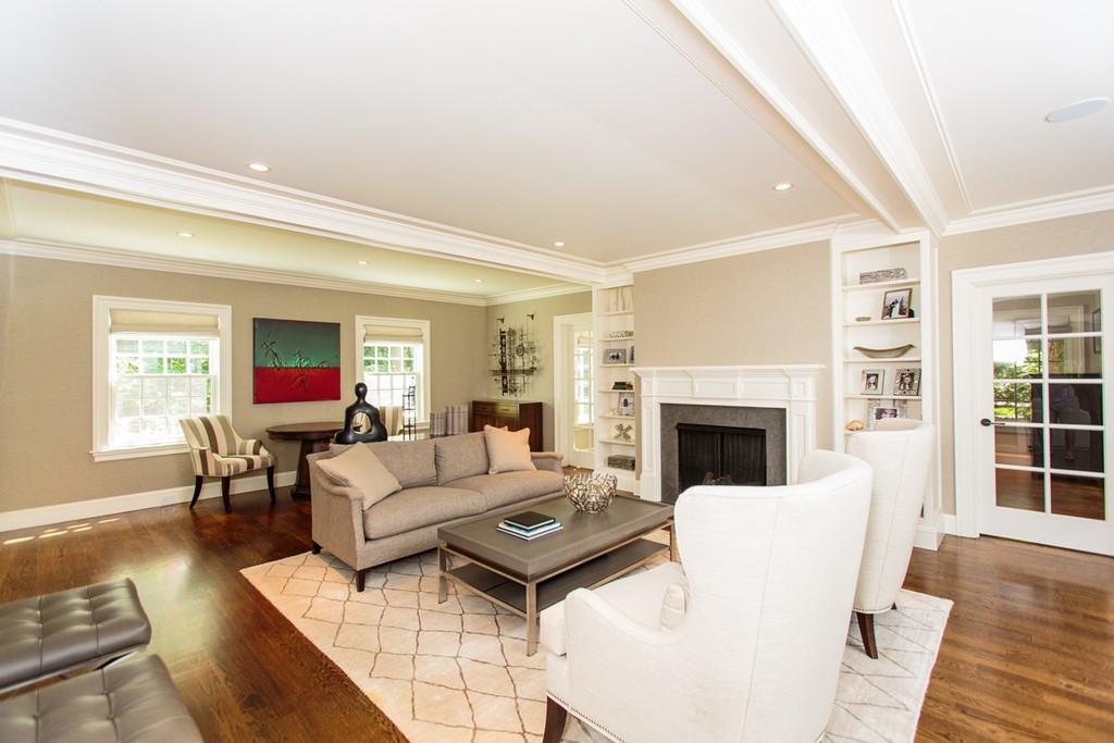 35 Hundreds Road Wellesley, MA 02481 - Photo 6 of 27 a living room with furniture large window and a fireplace