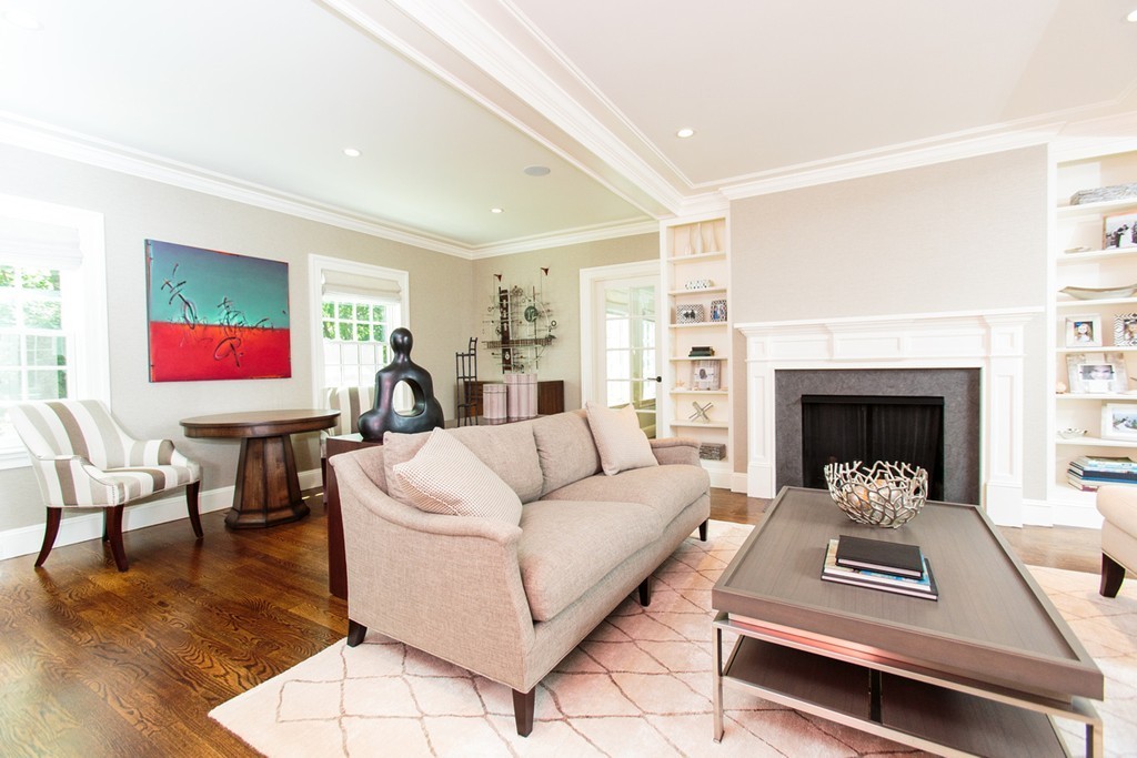 35 Hundreds Road Wellesley, MA 02481 - Photo 7 of 27 a living room with furniture and a fireplace