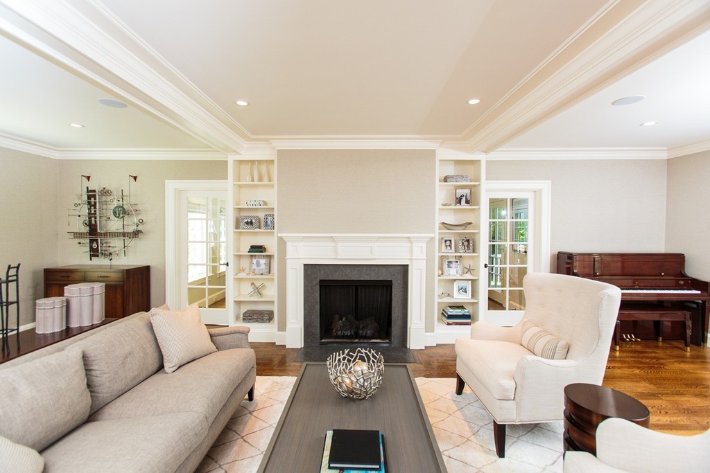 35 Hundreds Road Wellesley, MA 02481 - Photo 8 of 27 a living room with furniture and a fireplace