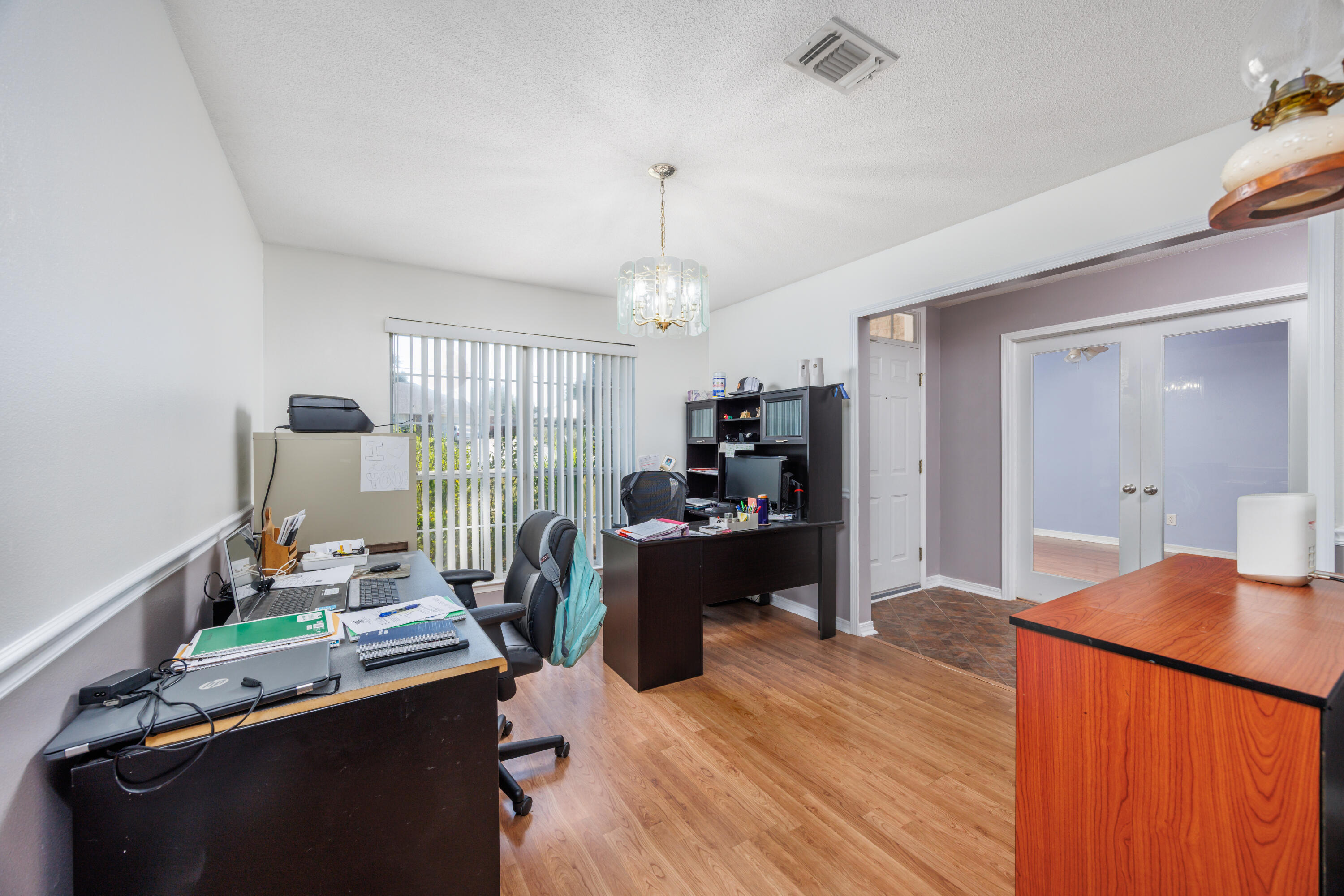 4860 Orlimar Street Crestview, FL 32536 - Photo 10 of 36 a room with furniture and a window