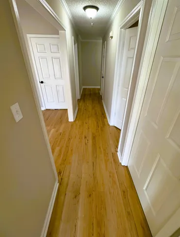 a bathroom with a sink a toilet a mirror and vanity