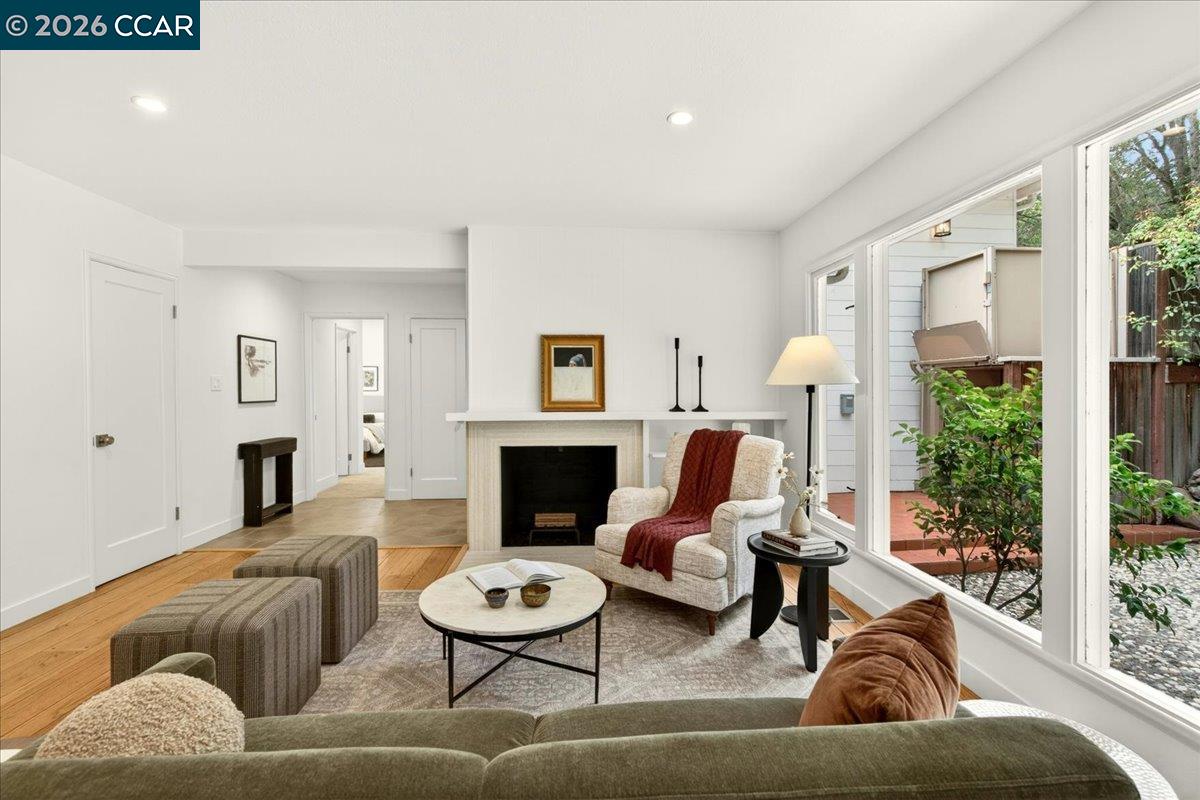 24 Las Vegas Road Orinda, CA 94563 - Photo 7 of 47 a living room with furniture and a fireplace